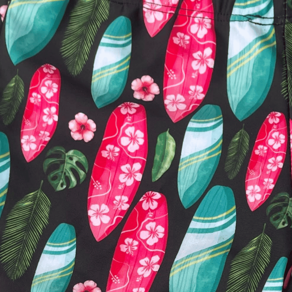 Kikx Extra Life Jammer Swimsuit in Island Vibe Surfboards on black