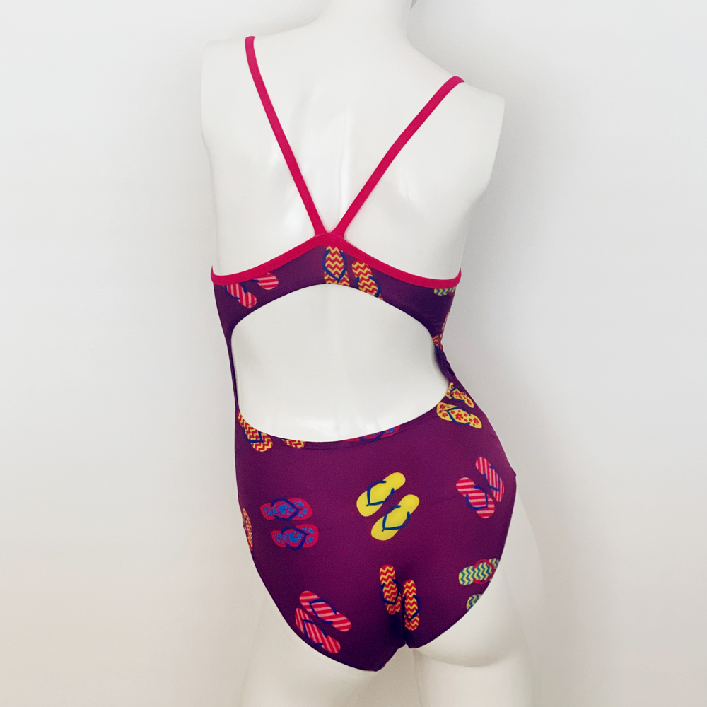 Kikx Extra Life Thin Strap Swimsuit in Slip Slops on Dark Purple with Bright Pink Straps