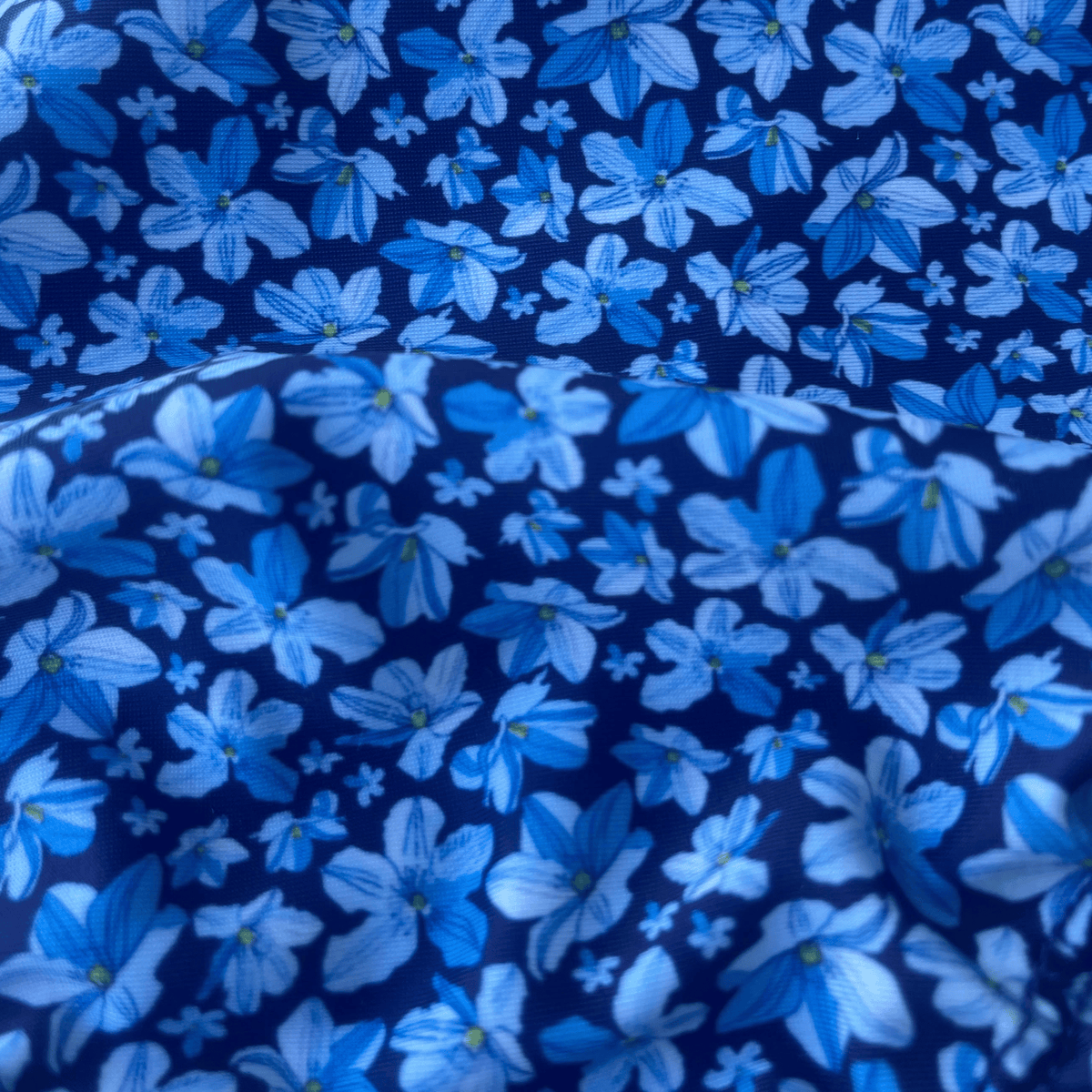 Kikx Extra Life Fastback Swimsuit in a Dark Blue Midnight Bloom Print