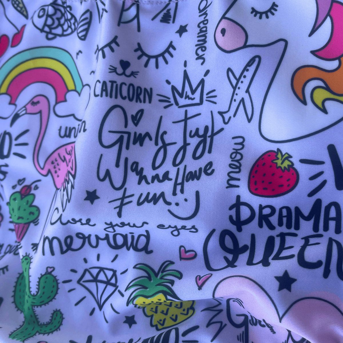 Kikx Extra Life Fastback Swimsuit in Unicorn and Summer Theme on Light Lilac