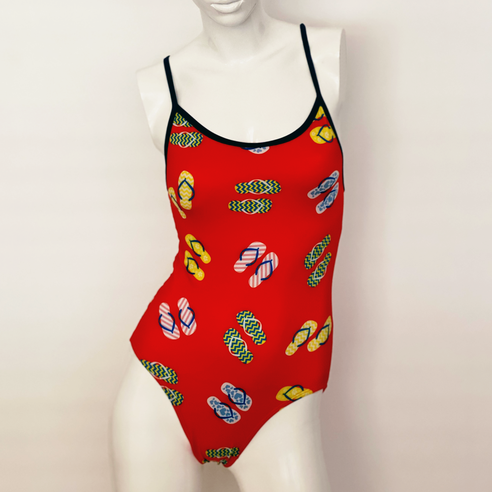 Kikx Extra Life Thin Strap Swimsuit in Slip Slops on Coral with Black Straps