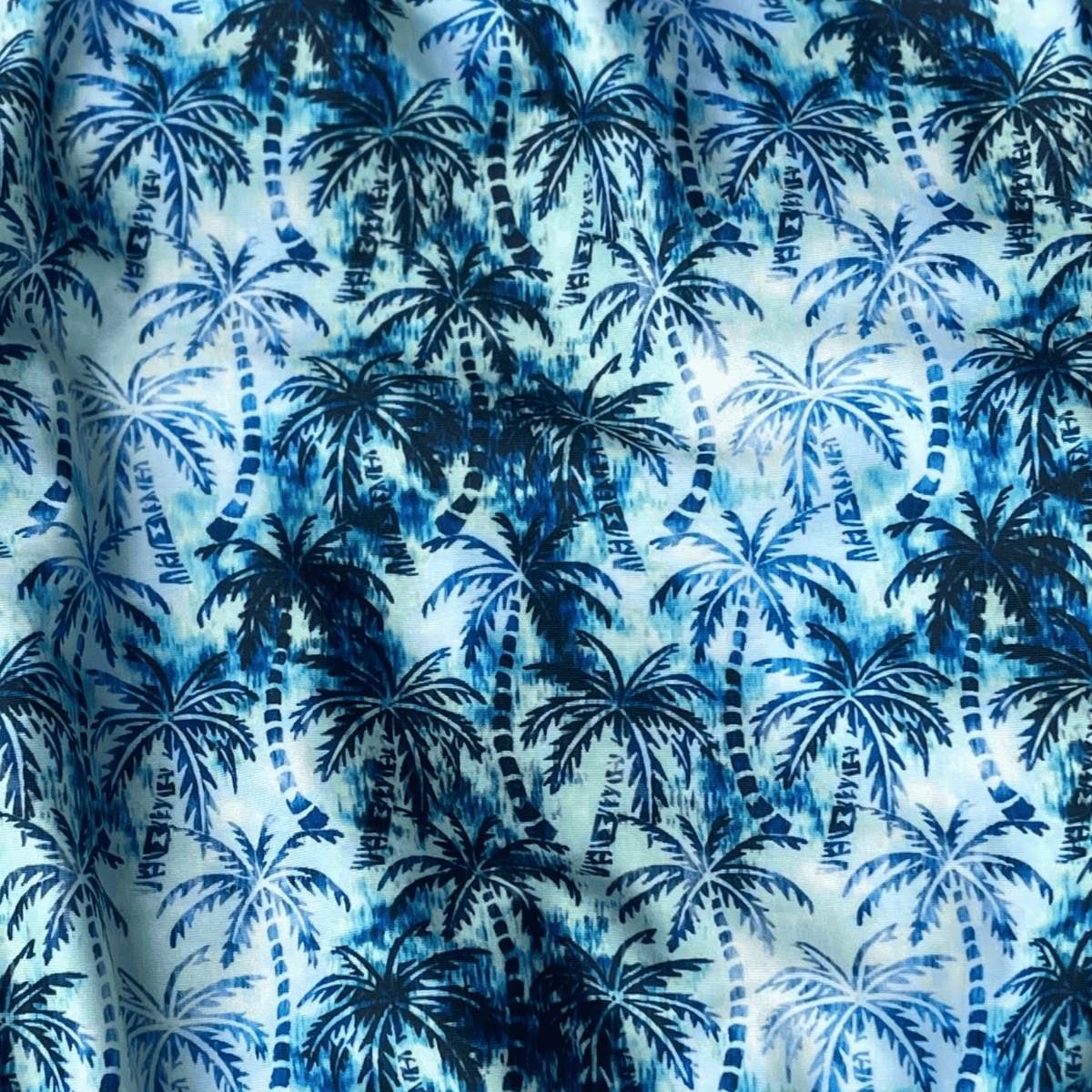 Kikx Extra Life Fastback Swimsuit in Hawaiian Haze Design on Pale Aquamarine