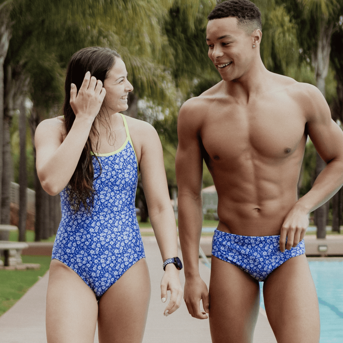 Kikx Extra Life Thin Strap Swimsuit in a Dark Blue Midnight Bloom Print with Neon Yellow Straps