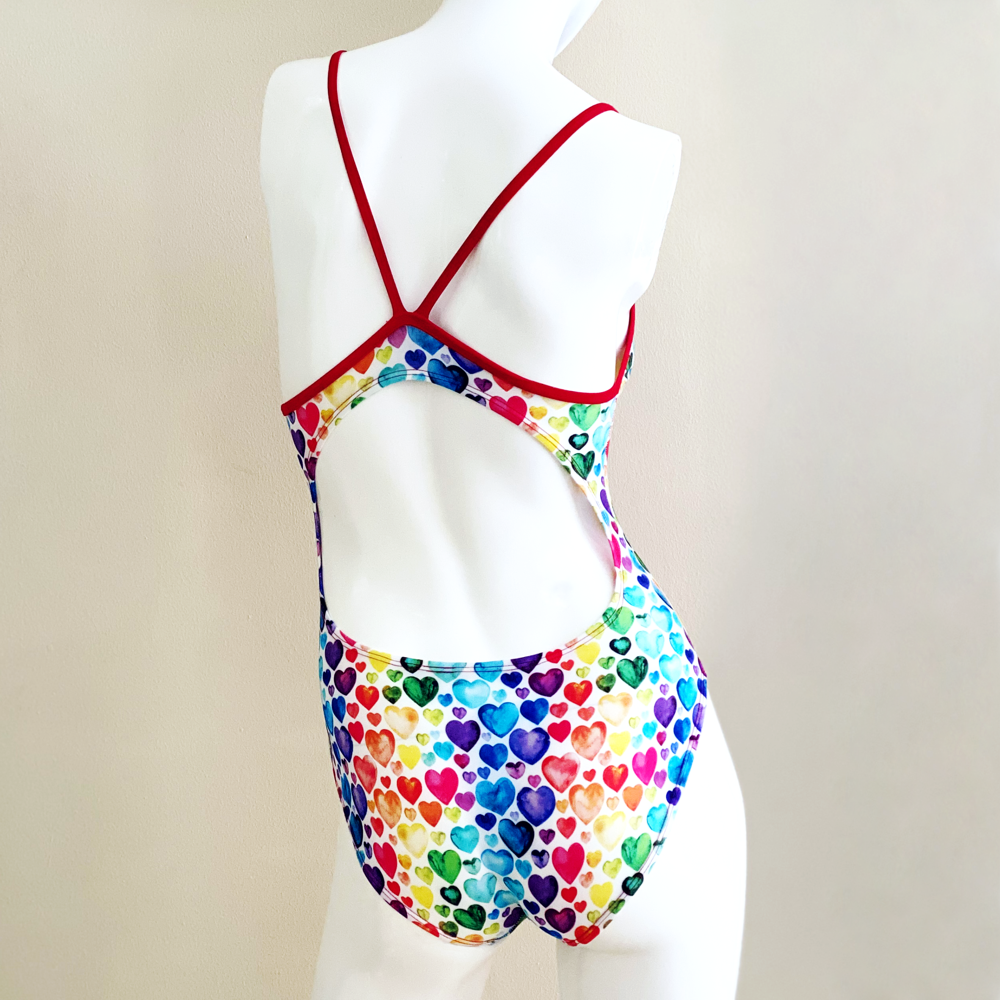 Extra Life Thin Strap Swimsuit in Multi Hearts on White with Red Straps